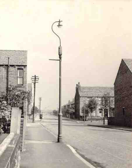 Streetlighting on a trafficless road in the 1950's
